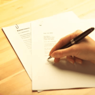 Signing a cover letter for a visa application