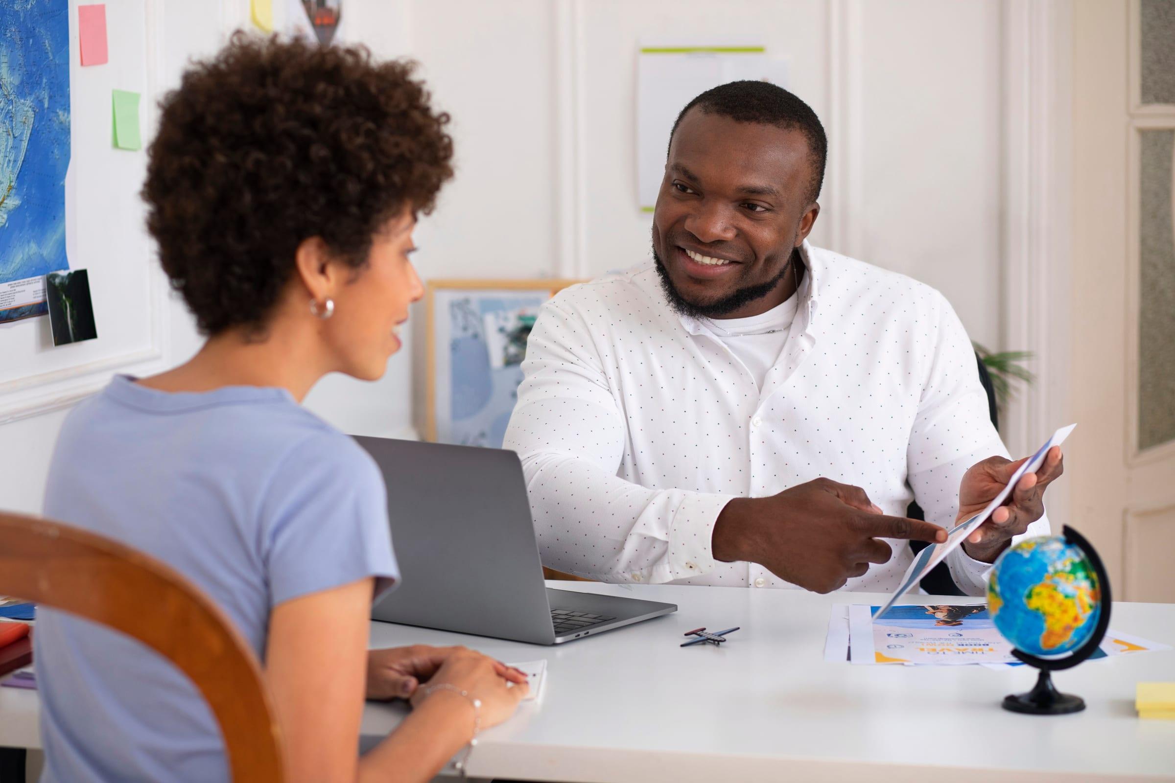 OMCO Migrations consultant advising a client during a consultation