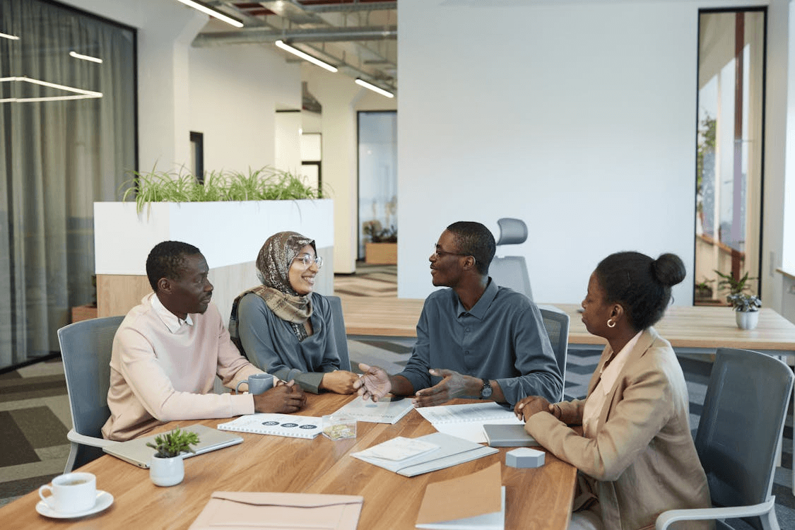 OMCO Migrations consultants meeting with clients