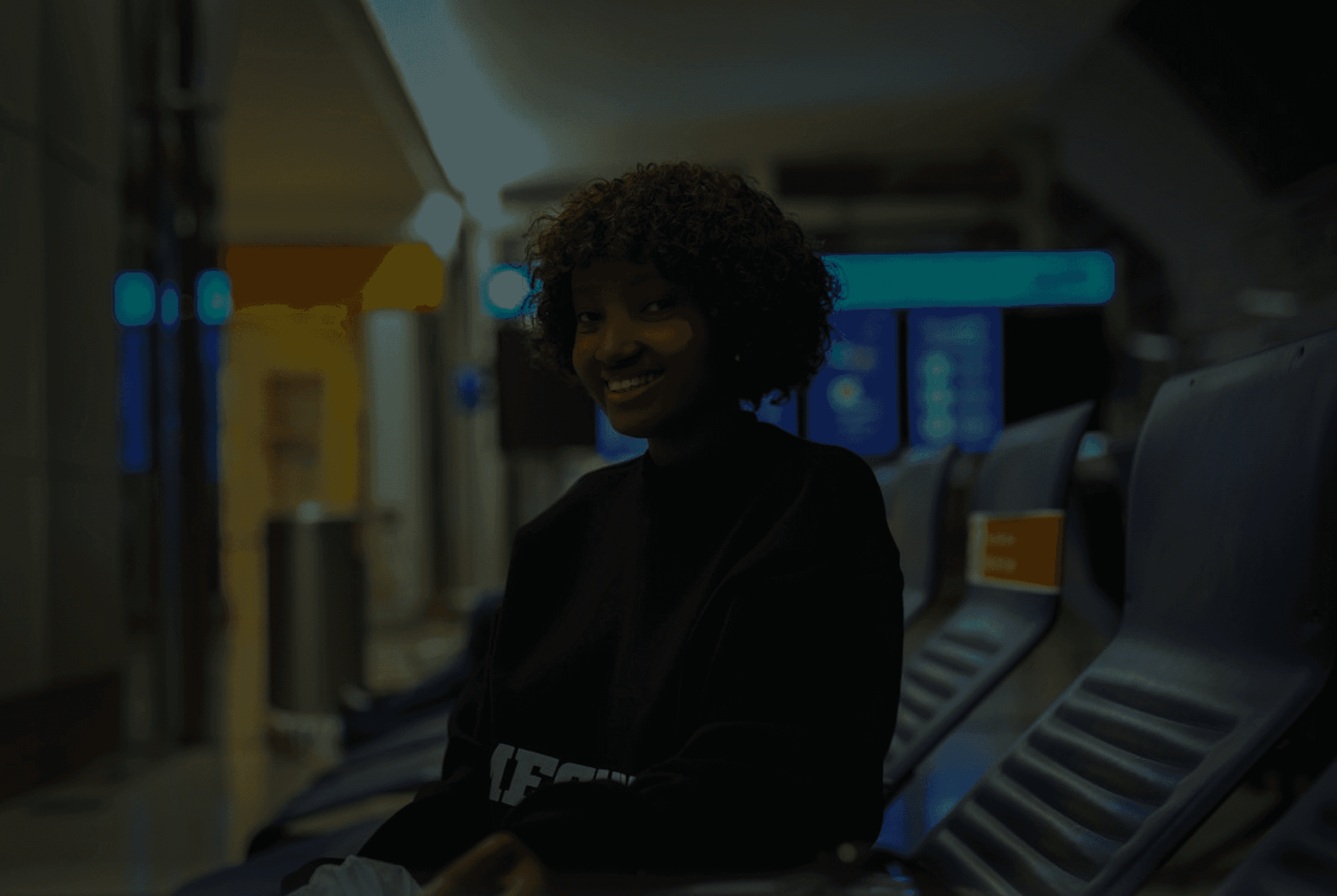 Smiling traveller waiting at an airport